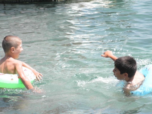 Random Armenian kids playing on the lake